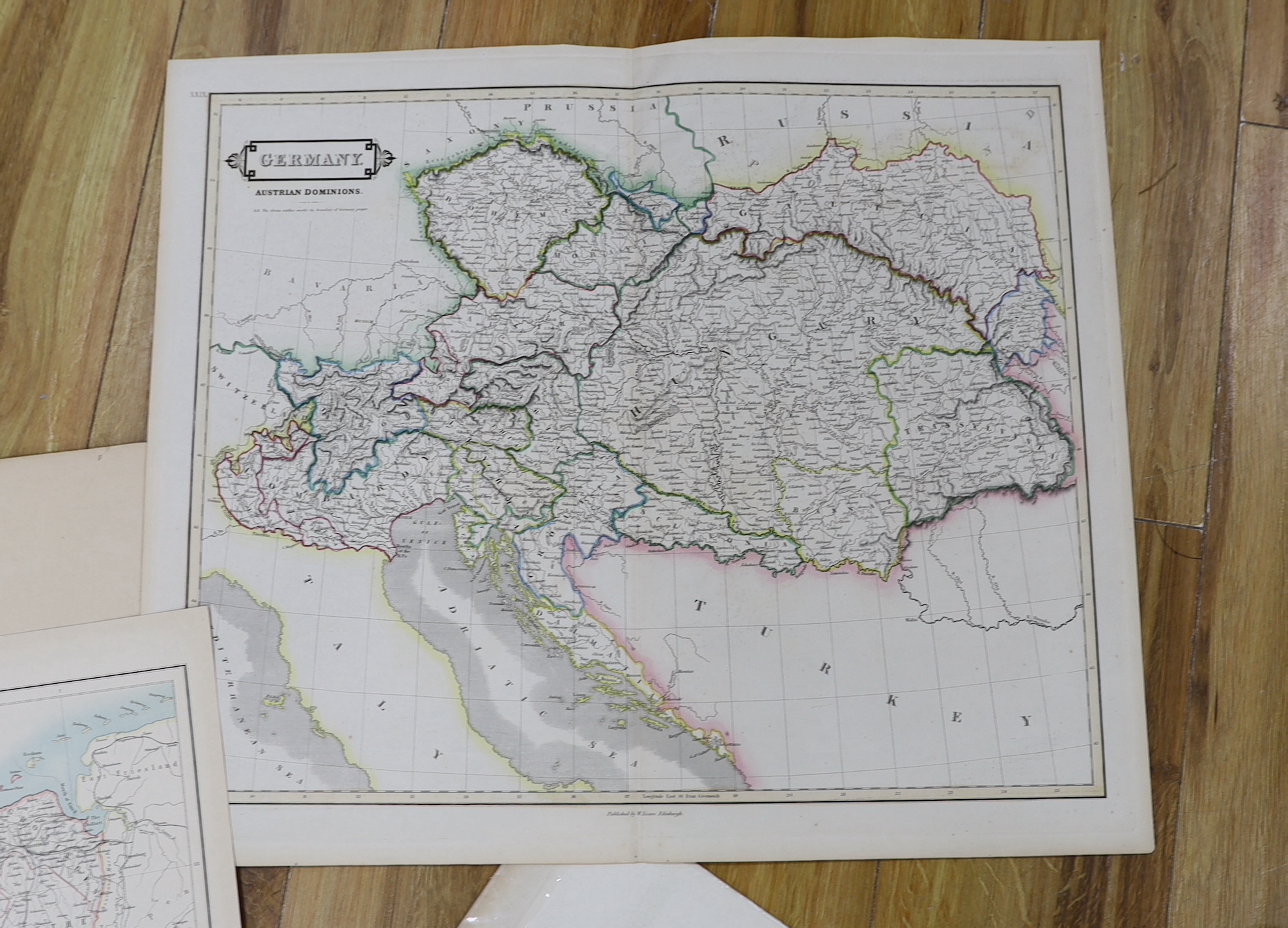 Eight antique unframed maps including Europe and Belgium by A K Johnston, Austrian Dominions, for Thomson’s New General Atlas 1816 and Empire D’Autriche